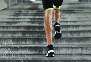 A man running up the stairs outdoors