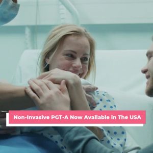 An image of a two people holding a newborn baby behind text 'Non-invasive PGT-A now available in the USA' for a press release